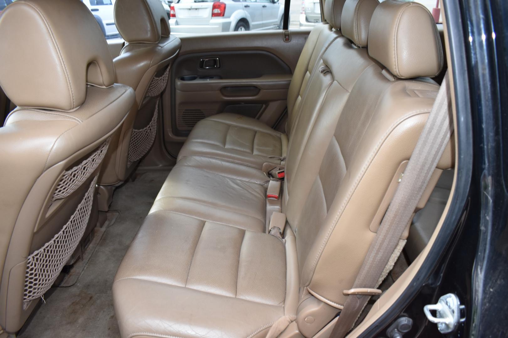 2006 Black /Brown Honda Pilot EX w/ Leather (5FNYF28556B) with an 3.5L V6 SOHC 24V engine, 5-Speed Automatic Overdrive transmission, located at 5925 E. BELKNAP ST., HALTOM CITY, TX, 76117, (817) 834-4222, 32.803799, -97.259003 - Buying a 2006 Honda Pilot EX can offer several benefits, building upon the strengths of its predecessors while incorporating some improvements. Here are some potential advantages: Reliability: Honda has a strong reputation for building reliable vehicles, and the 2006 Pilot is no exception. By 2006, - Photo#24